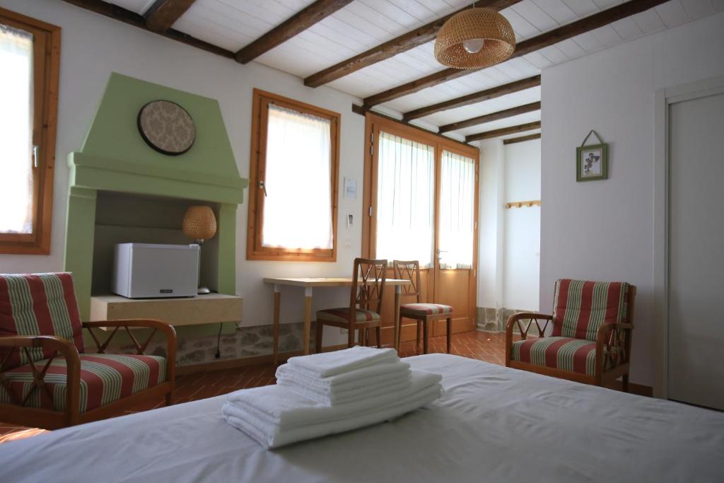 Postel nebo postele na pokoji v ubytování I grilli b&b
