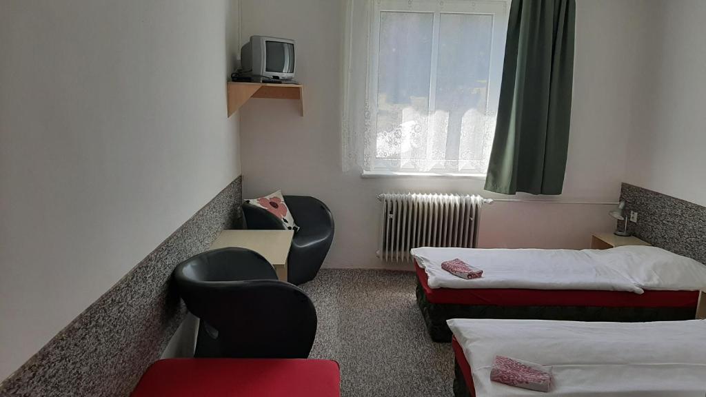 Postel nebo postele na pokoji v ubytování Chata Ořovský