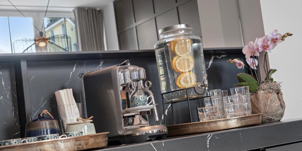 Majoituspaikan Boutique Hotel Wellenberg keittiö tai keittotila