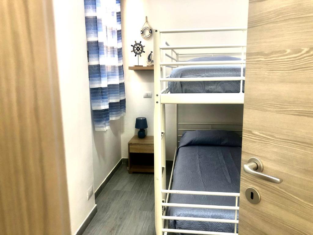 Posteľ alebo postele v izbe v ubytovaní Casa Gio - Appartamenti Vacanze