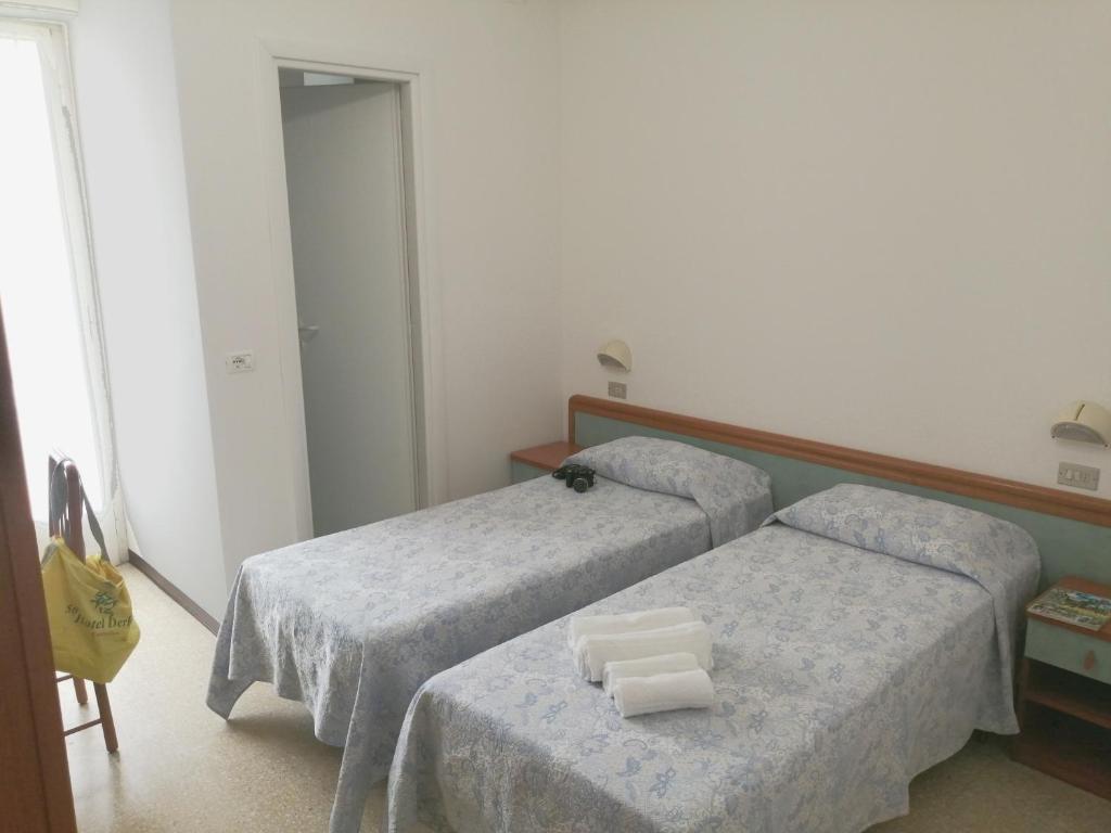 Postel nebo postele na pokoji v ubytování Hotel Derby