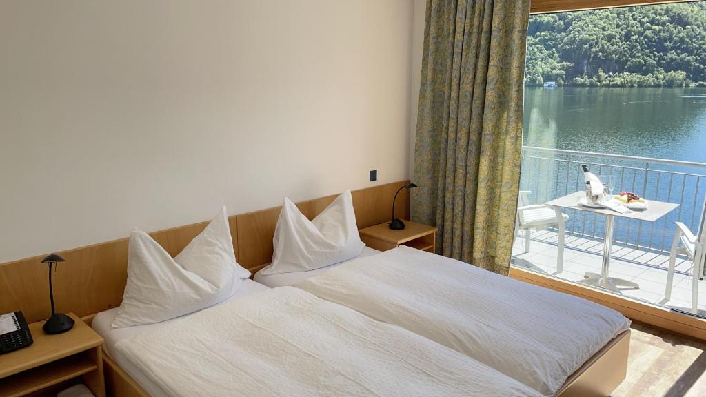 Postel nebo postele na pokoji v ubytování Tresa Bay Hotel