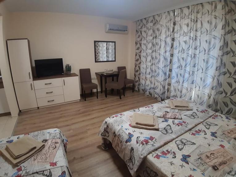 Postel nebo postele na pokoji v ubytování Студио-"Ziko"