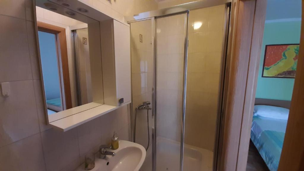 Koupelna v ubytování Apartments Kekica