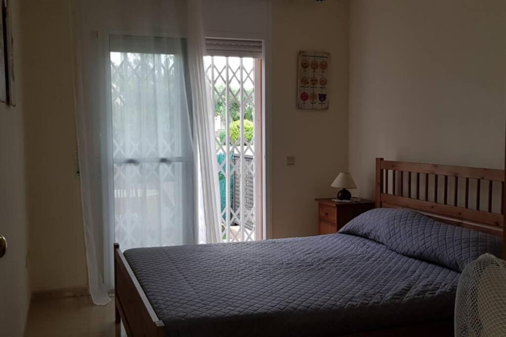 Postel nebo postele na pokoji v ubytování Villa MIAMI PLAYA EN ESPAGNE