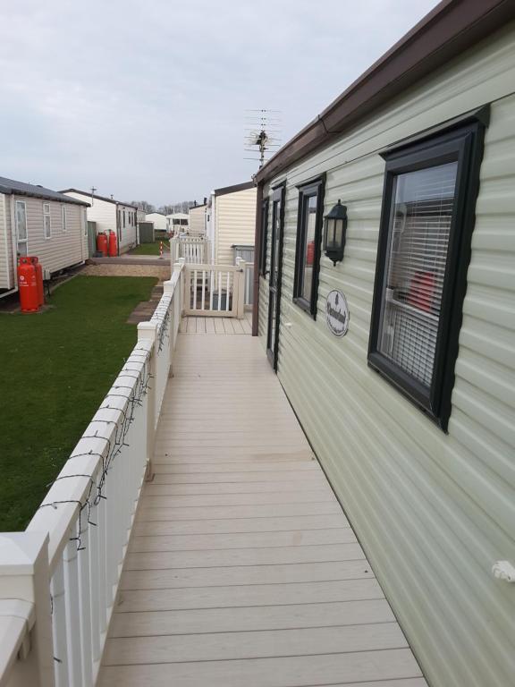 a walkway leading to the side of a house at Annandale skegness in Skegness