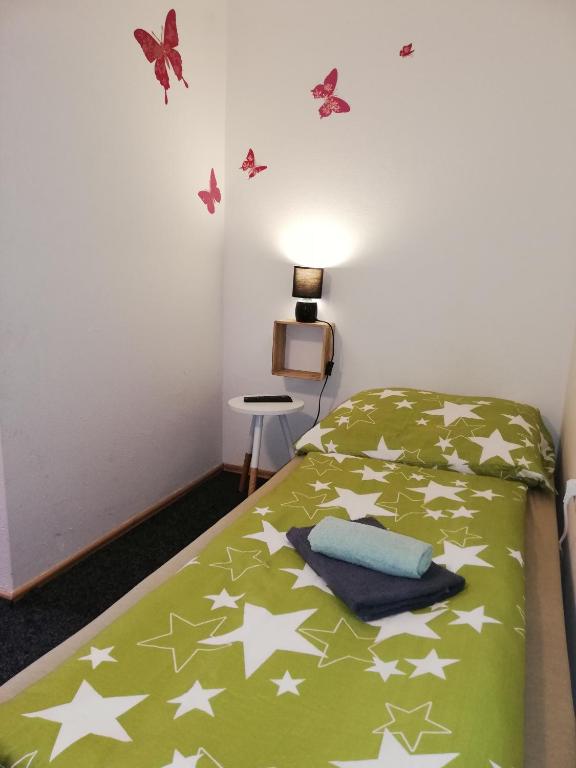 Postel nebo postele na pokoji v ubytování Villa LIKE "garden-grill"