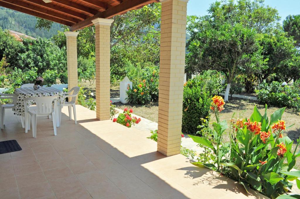 A garden outside Beach house Yannis in Agios Gordios beach on Corfu