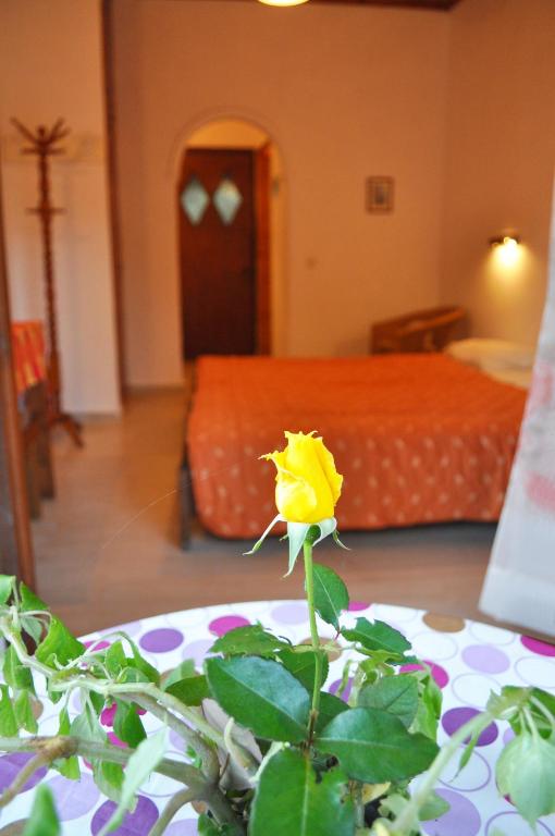 A bed or beds in a room at Beach house Yannis in Agios Gordios beach on Corfu