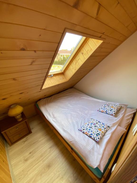 Postel nebo postele na pokoji v ubytování Przystanek Kaszuby