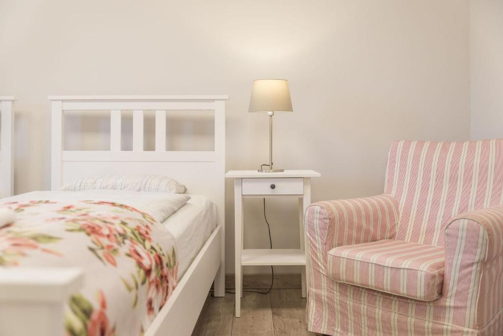 Posteľ alebo postele v izbe v ubytovaní Apartament pod Twierdzą