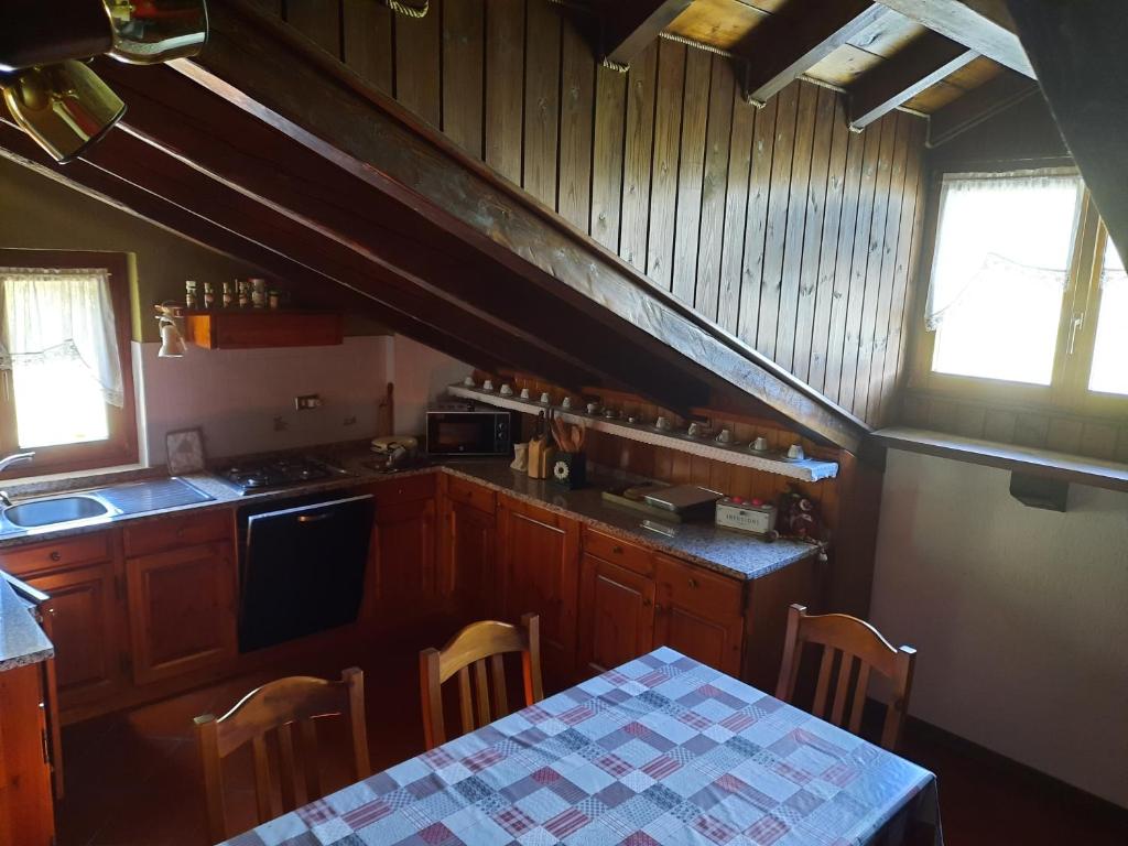 Kuchyň nebo kuchyňský kout v ubytování Pila vacanze