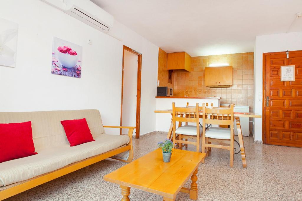 A kitchen or kitchenette at Apartamentos Puet