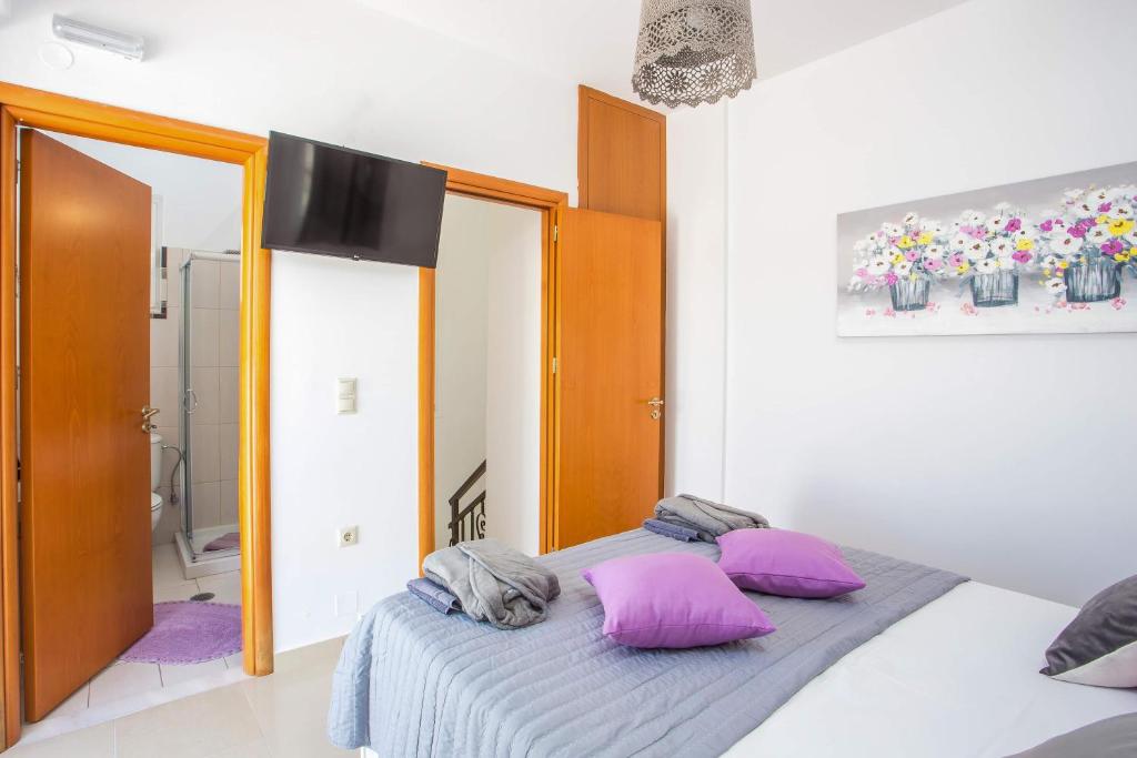 Postel nebo postele na pokoji v ubytování La Casa Del Amor