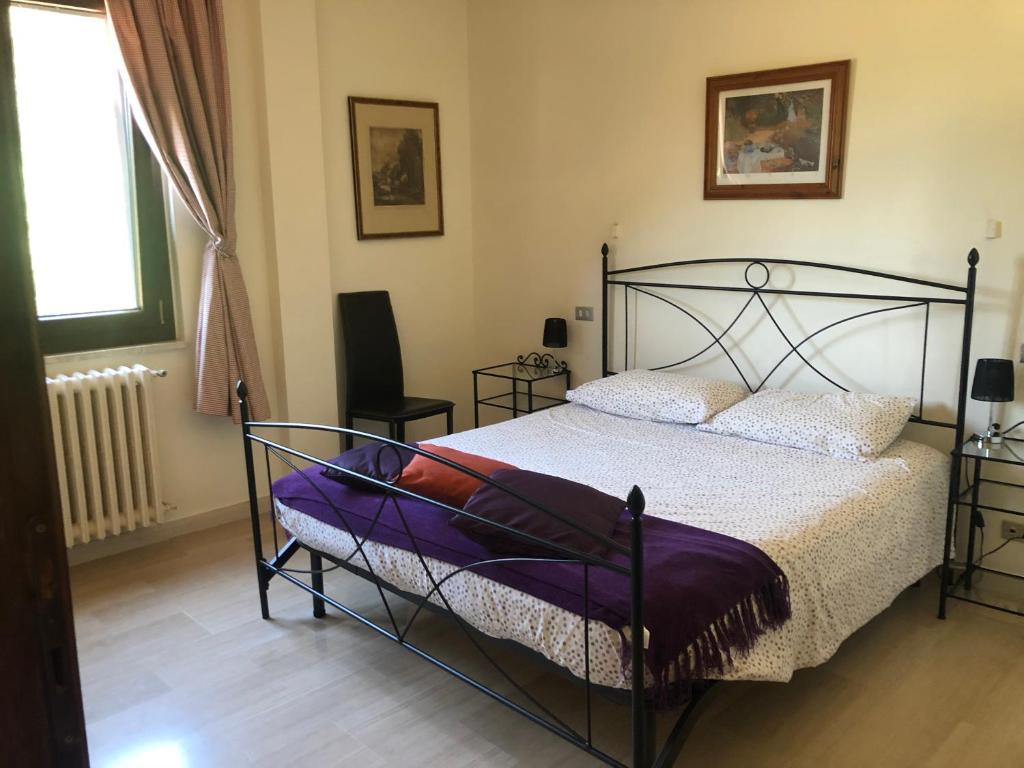 Postel nebo postele na pokoji v ubytování Casa di Rebecca