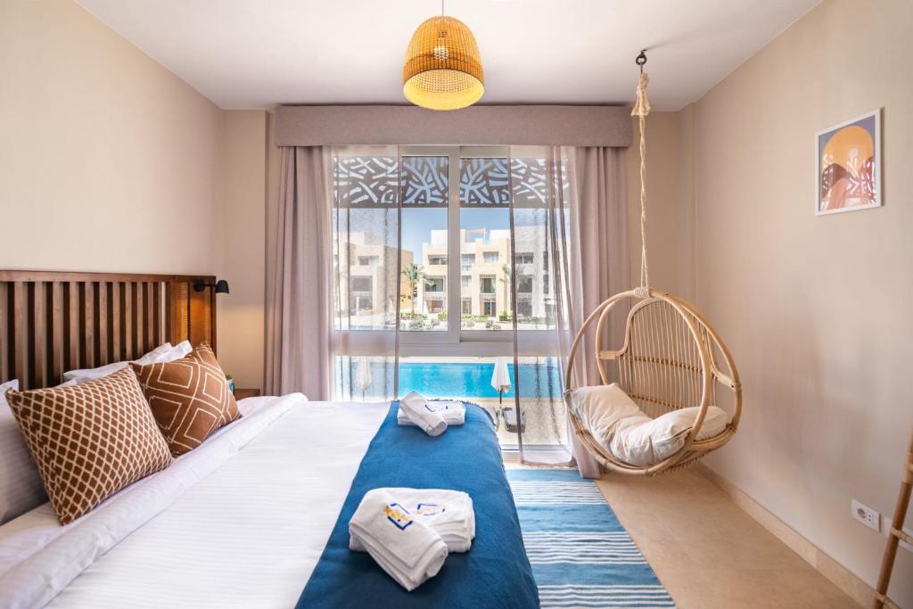 Ένα ή περισσότερα κρεβάτια σε δωμάτιο στο Epic & Exquisite 2 BR w Beach & Pool Mangroovy