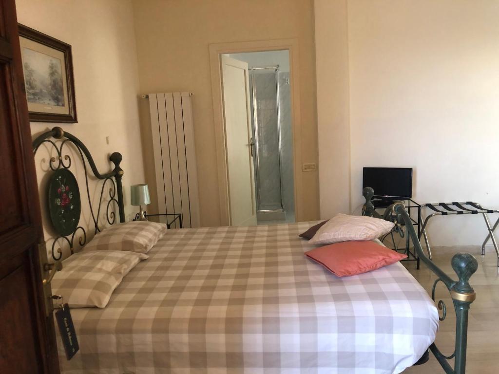 Postel nebo postele na pokoji v ubytování Casa di Rebecca