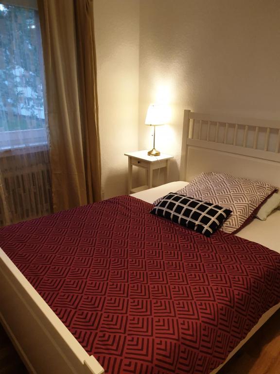 En eller flere senge i et værelse på Relax UND Ruhe
