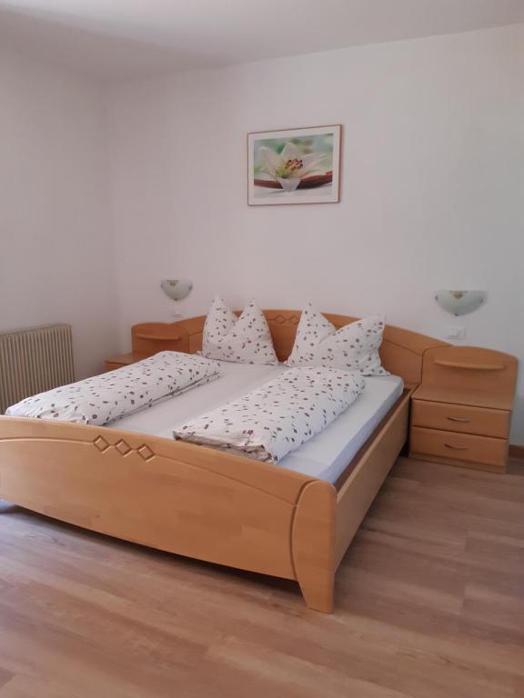 Postel nebo postele na pokoji v ubytování Stuberhof