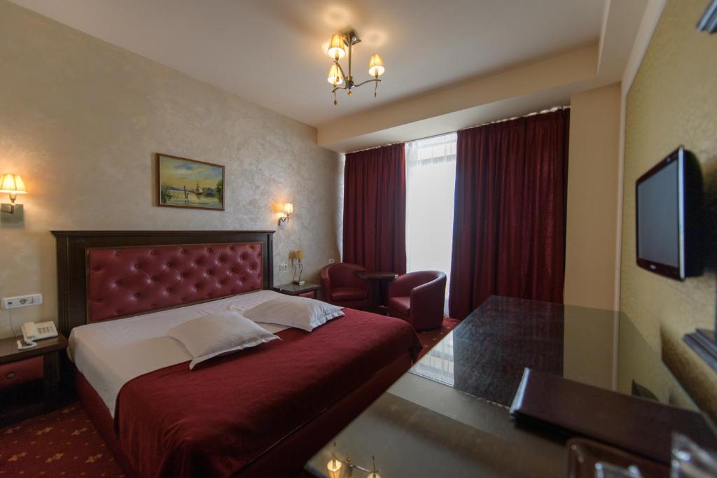 TV a/nebo společenská místnost v ubytování Hotel Golden Palace