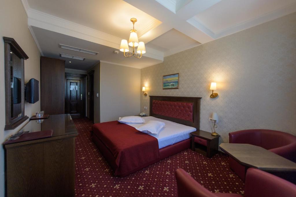 TV a/nebo společenská místnost v ubytování Hotel Golden Palace