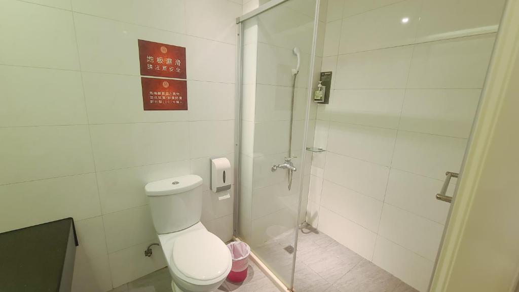 Koupelna v ubytování Chao She Hotel