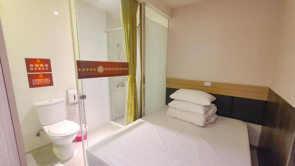 Koupelna v ubytování Chao She Hotel