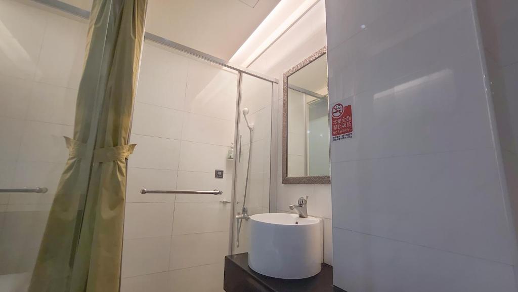 Koupelna v ubytování Chao She Hotel