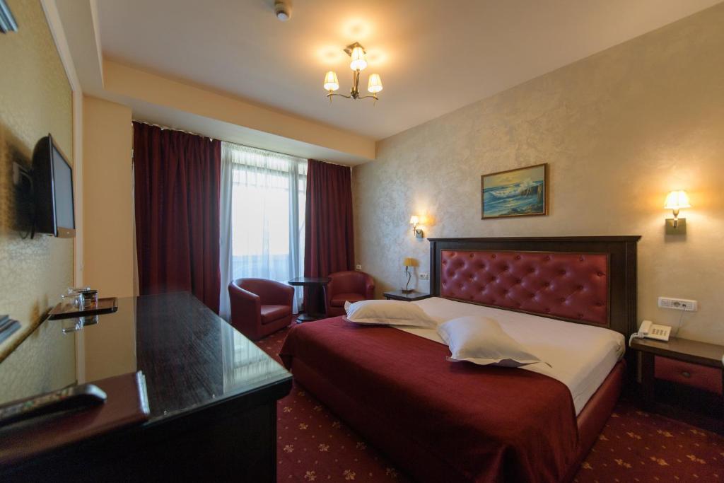 TV a/nebo společenská místnost v ubytování Hotel Golden Palace
