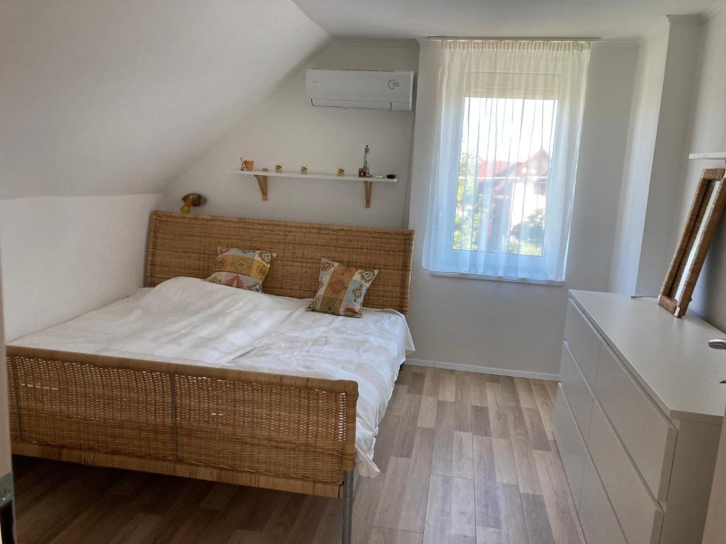 Posteľ alebo postele v izbe v ubytovaní Bogi House