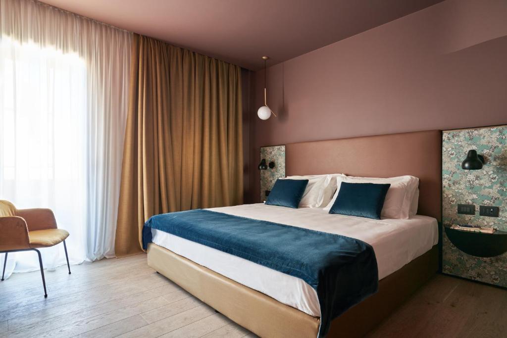 Łóżko lub łóżka w pokoju w obiekcie Executive Spa Hotel