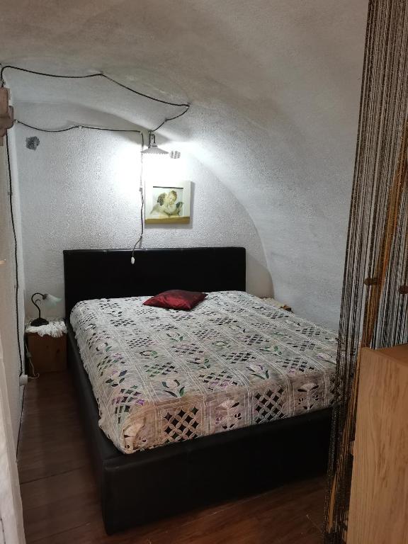 Postel nebo postele na pokoji v ubytování Casa MANETTA