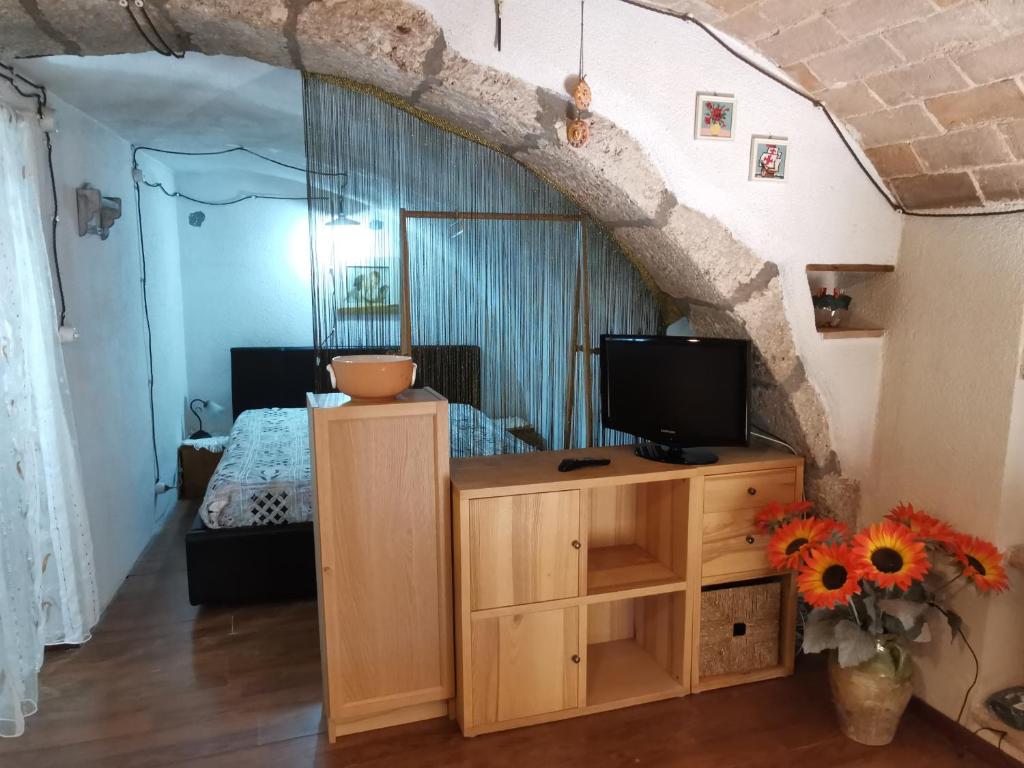 TV a/nebo společenská místnost v ubytování Casa MANETTA