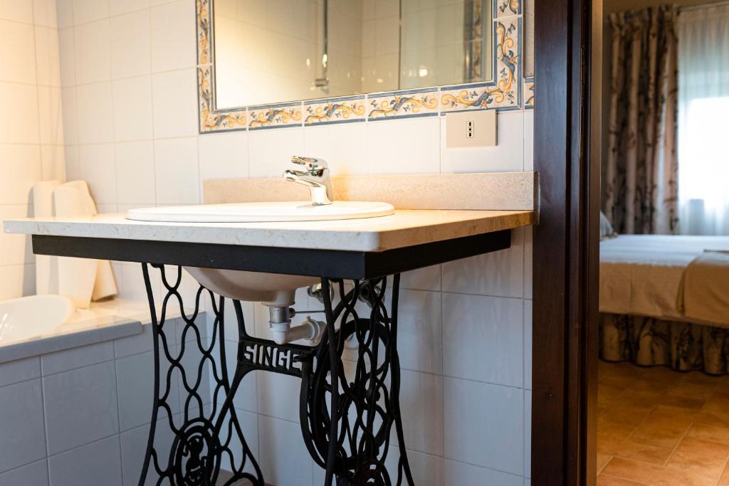 Posteľ alebo postele v izbe v ubytovaní Acqua di Civita Beauty & Rooms in Mercatello