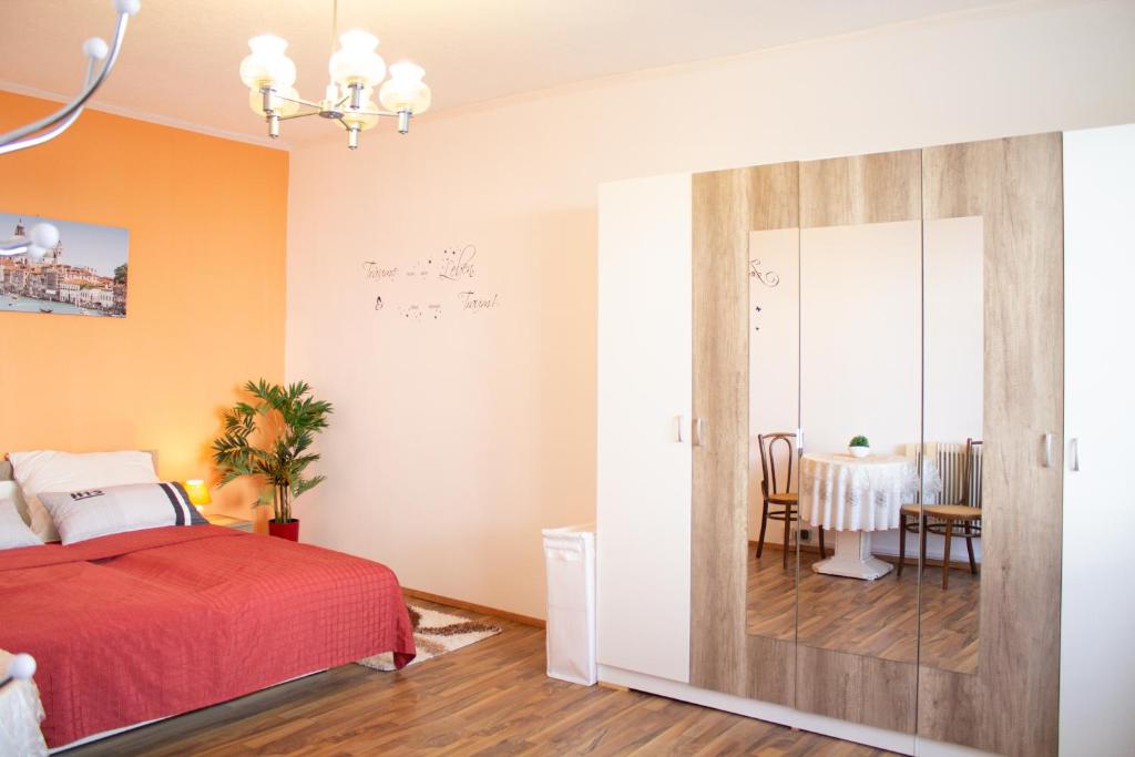 Posteľ alebo postele v izbe v ubytovaní Ferienwohnung Casa Flora