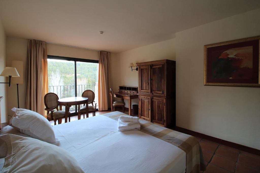 Posteľ alebo postele v izbe v ubytovaní La Figuerola Hotel & Restaurant