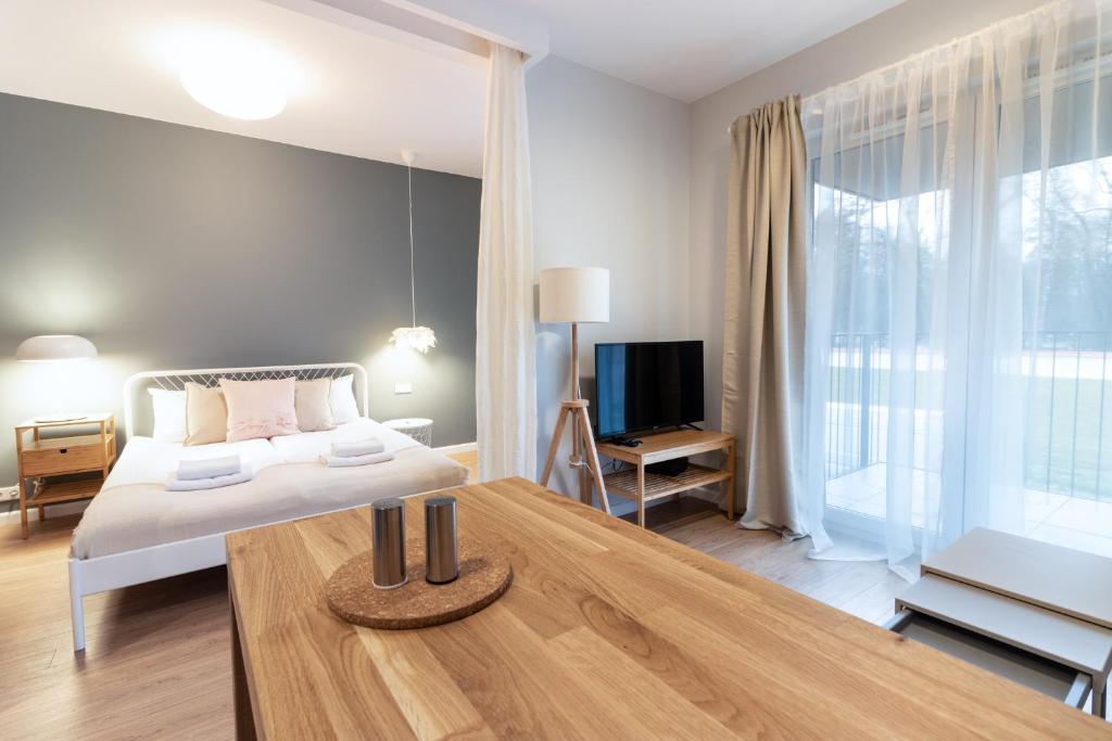 Posteľ alebo postele v izbe v ubytovaní Apartments nearto Main Railway Station