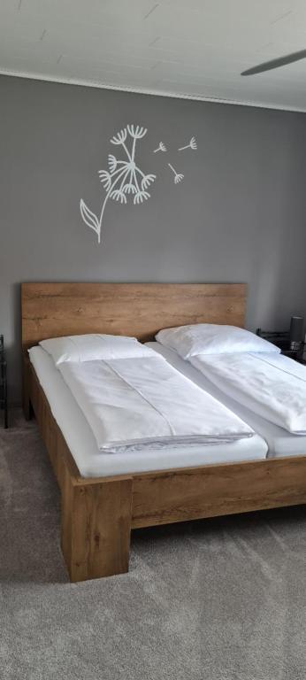 Postel nebo postele na pokoji v ubytování Hotel Zur Erholung & Restaurant Amme's Landhaus