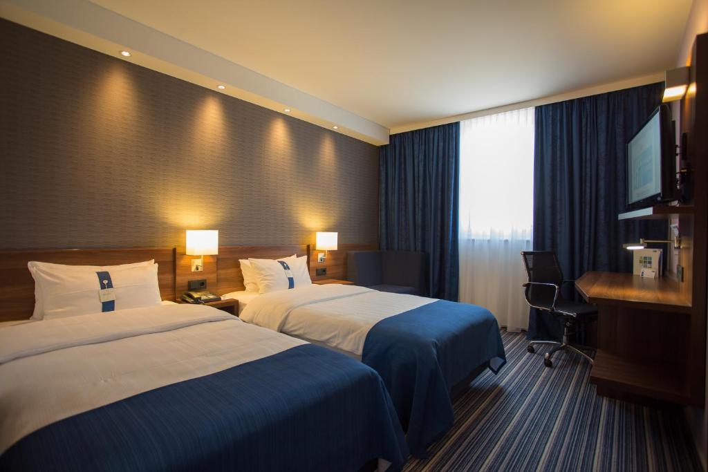 Postel nebo postele na pokoji v ubytování Holiday Inn Express Neunkirchen by IHG