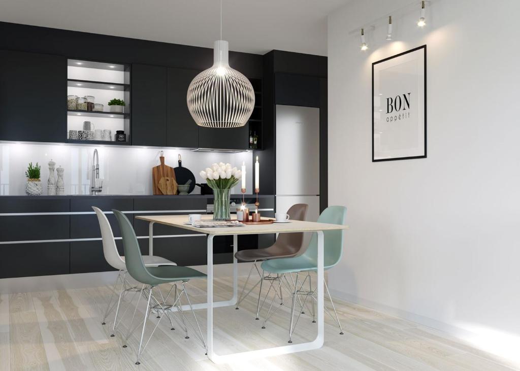 Kuchyň nebo kuchyňský kout v ubytování ÅhusBrygga Apartment Hotel