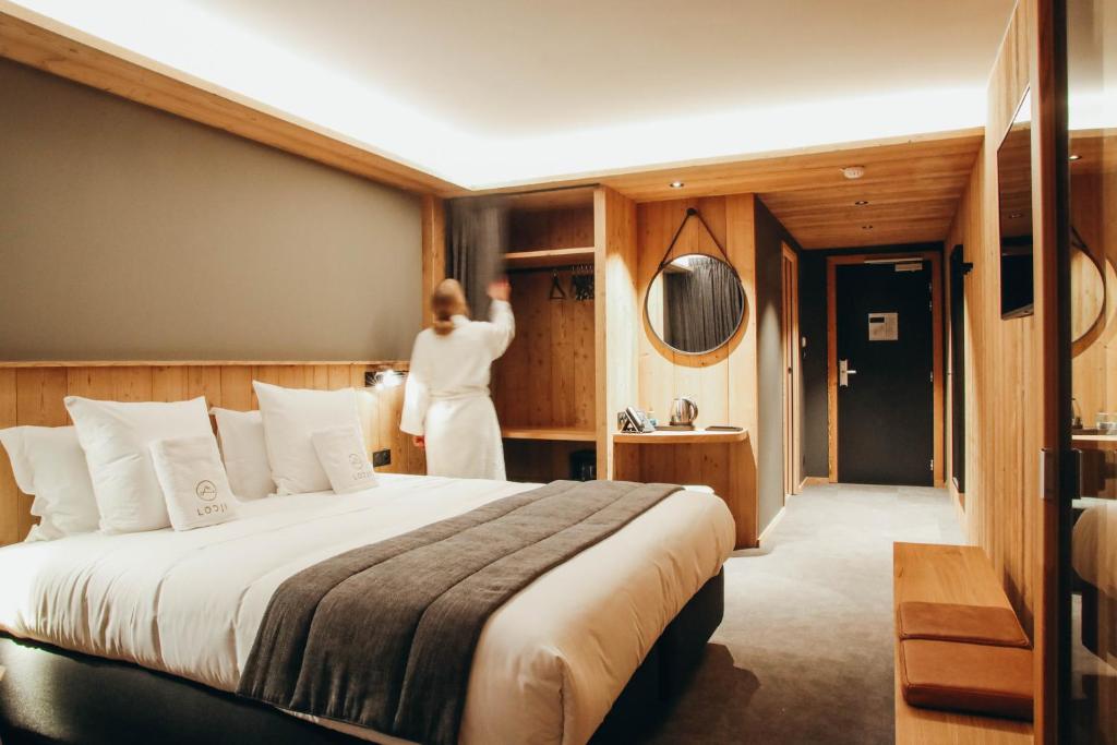 Postel nebo postele na pokoji v ubytování Lodji Hotel & spa