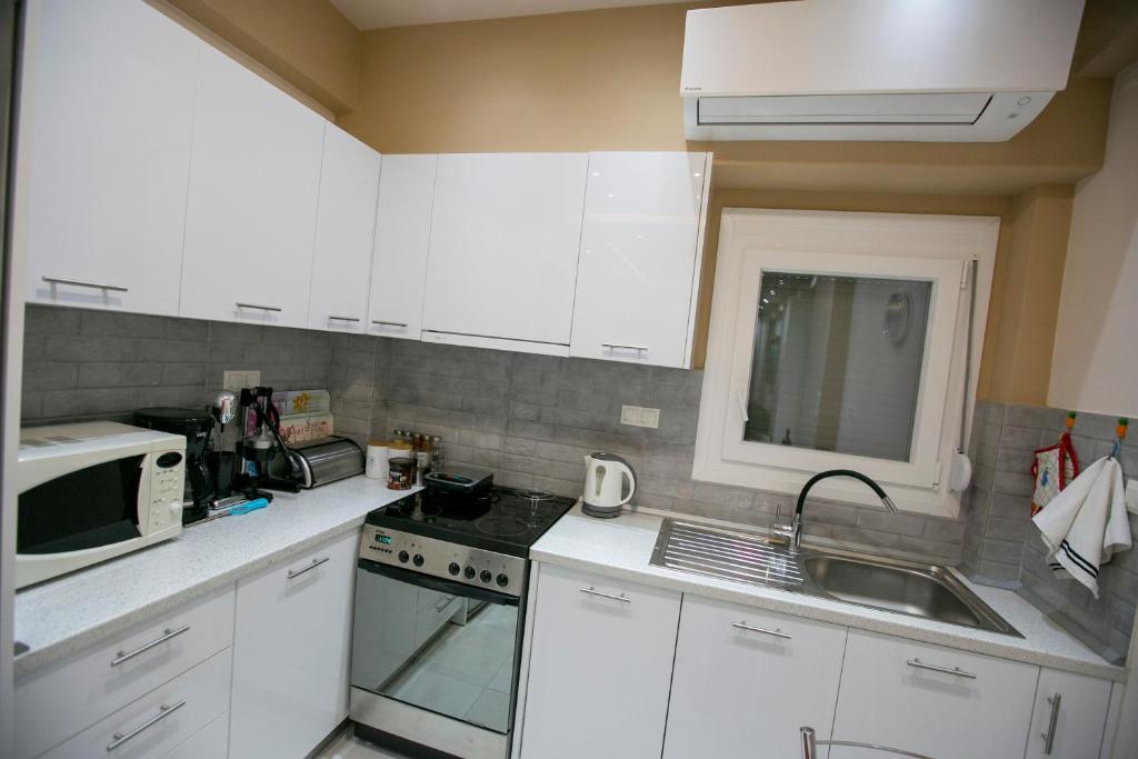 Kuchyň nebo kuchyňský kout v ubytování Moza House
