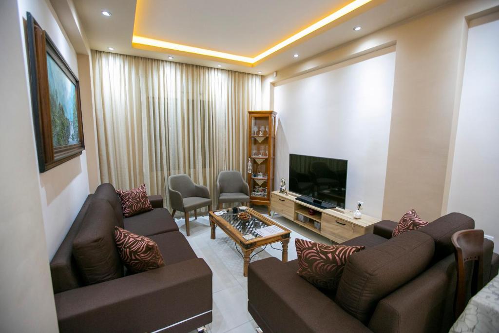 TV a/nebo společenská místnost v ubytování Moza House