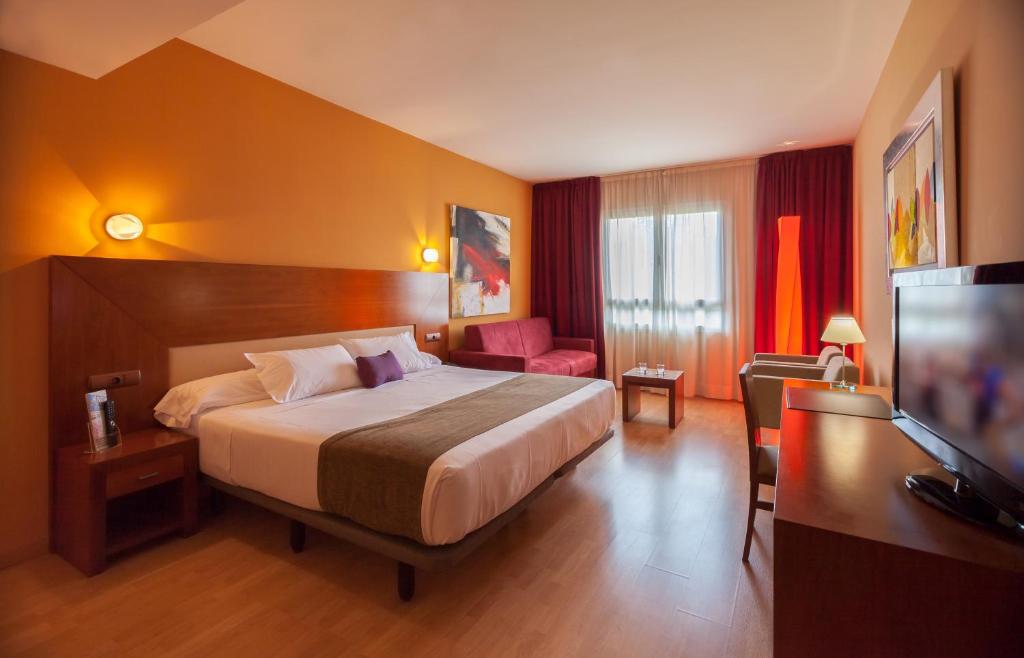Postel nebo postele na pokoji v ubytování Hotel Andia