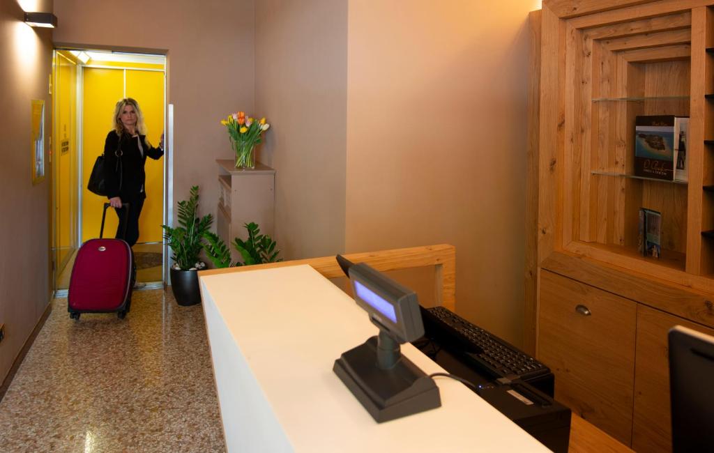 Telewizja i/lub zestaw kina domowego w obiekcie Hotel Corte Regina