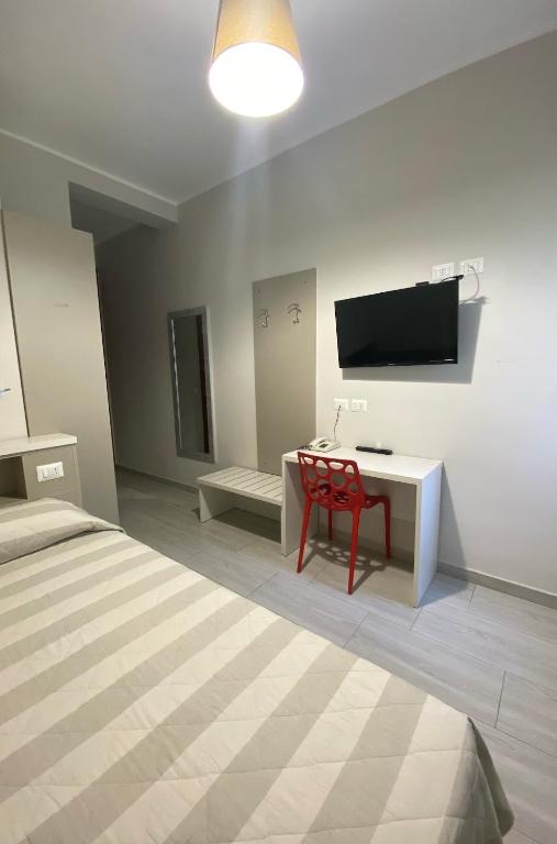 TV a/nebo společenská místnost v ubytování Hotel Due Giardini