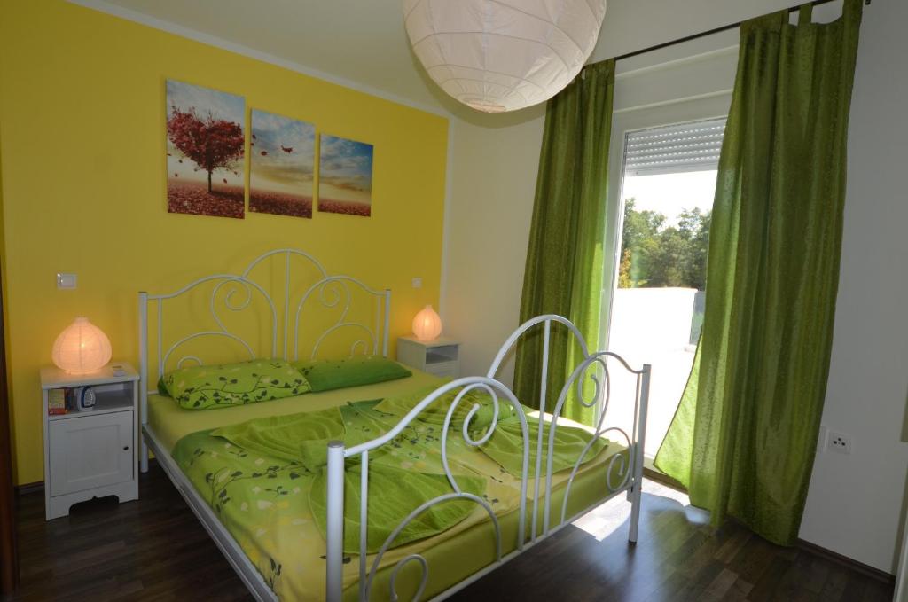 Postel nebo postele na pokoji v ubytování Villa Margherita