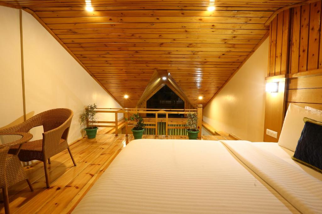 Postel nebo postele na pokoji v ubytování The Byke Nature Vilas Pure Veg