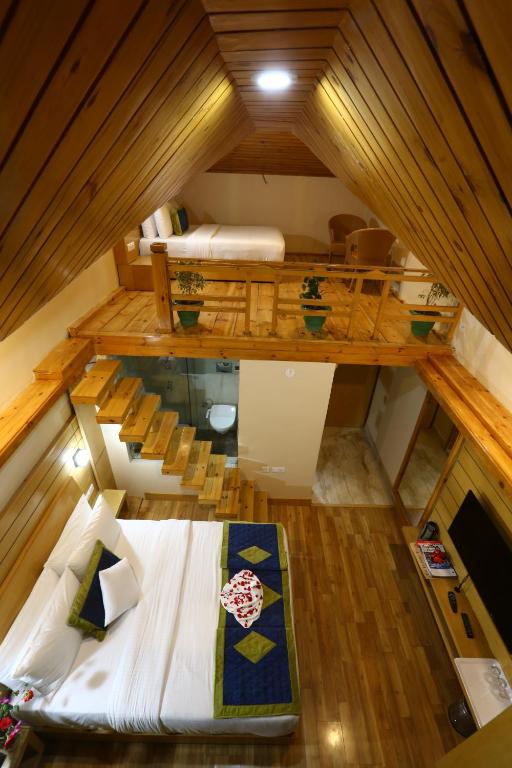 Postel nebo postele na pokoji v ubytování The Byke Nature Vilas Pure Veg