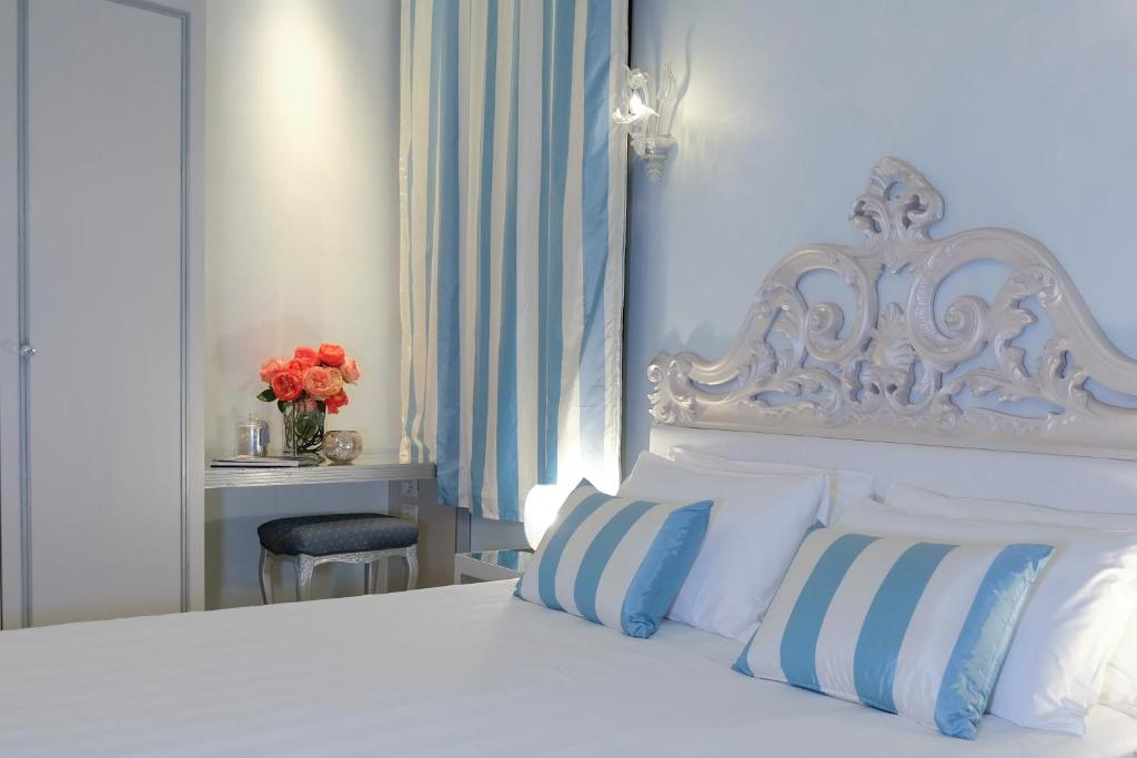 Postel nebo postele na pokoji v ubytování Relais Venezia